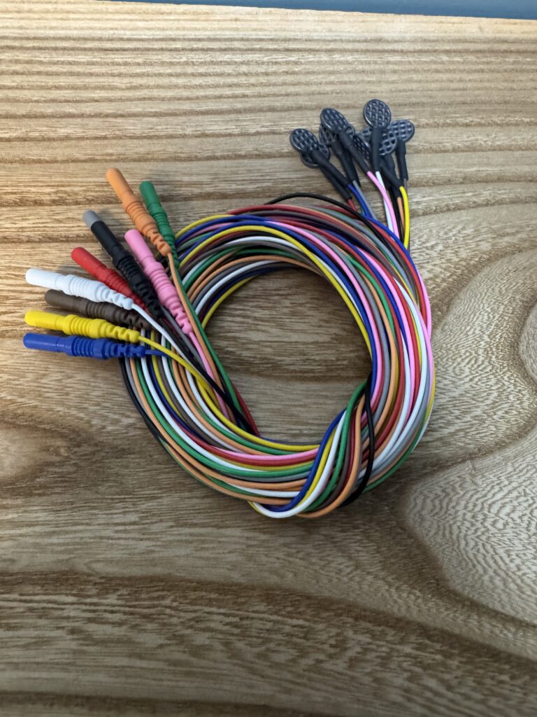 photo of colorful eeg leads in a loop
